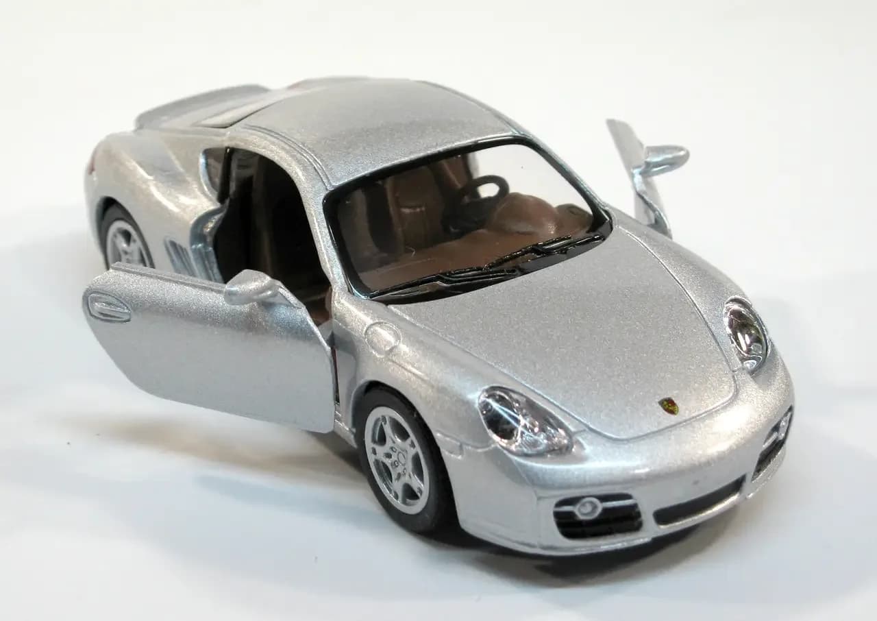Машина Kinsmart Porsche Cayman S 1:34 KT5307W фото 3