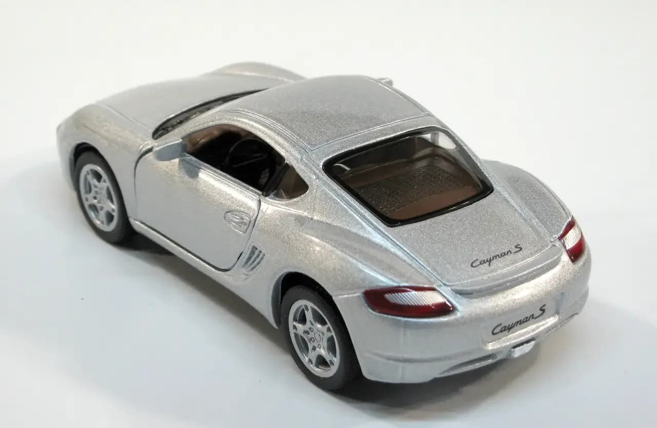 Машина Kinsmart Porsche Cayman S 1:34 KT5307W фото 4