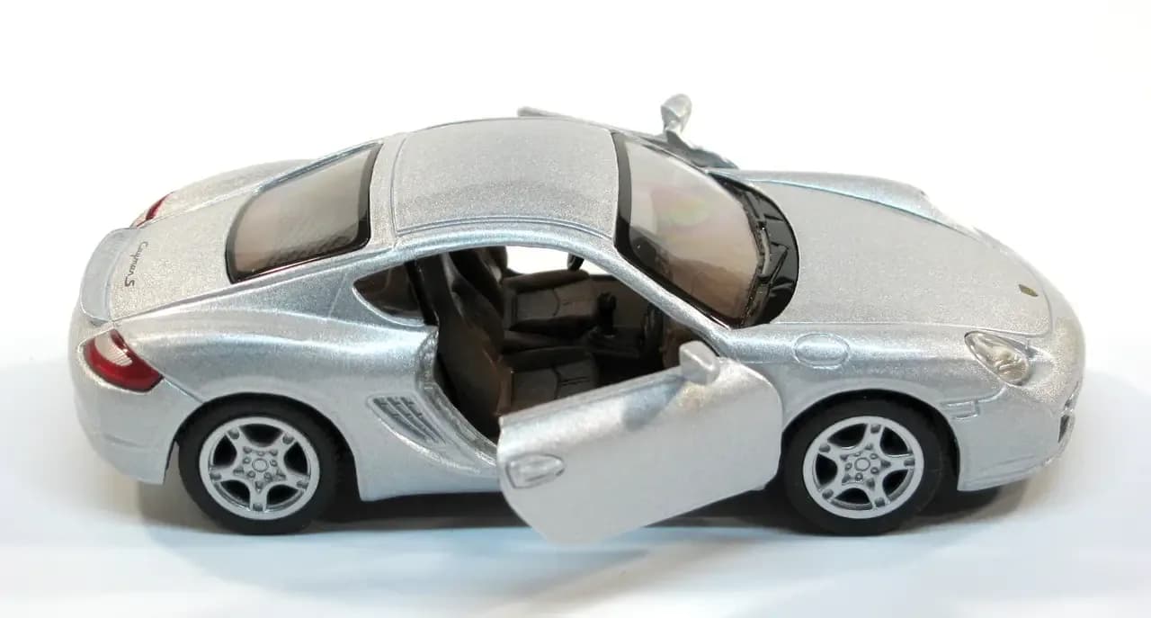 Машина Kinsmart Porsche Cayman S 1:34 KT5307W фото 7